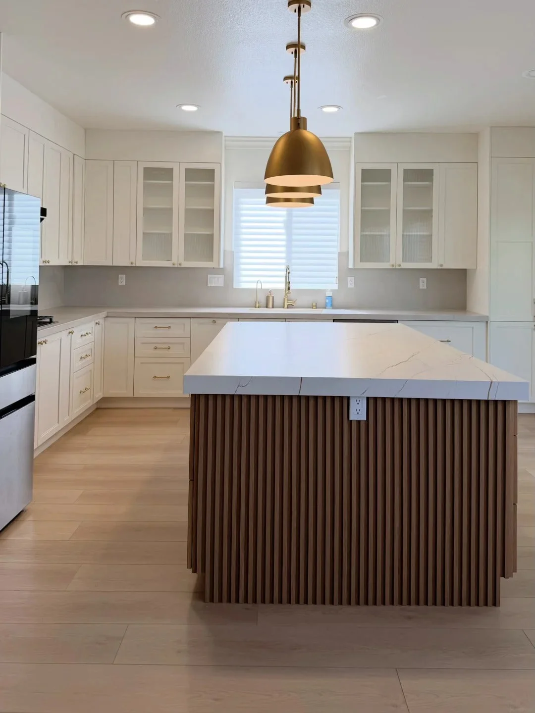 Finished kitchen with custom cabinetry and island