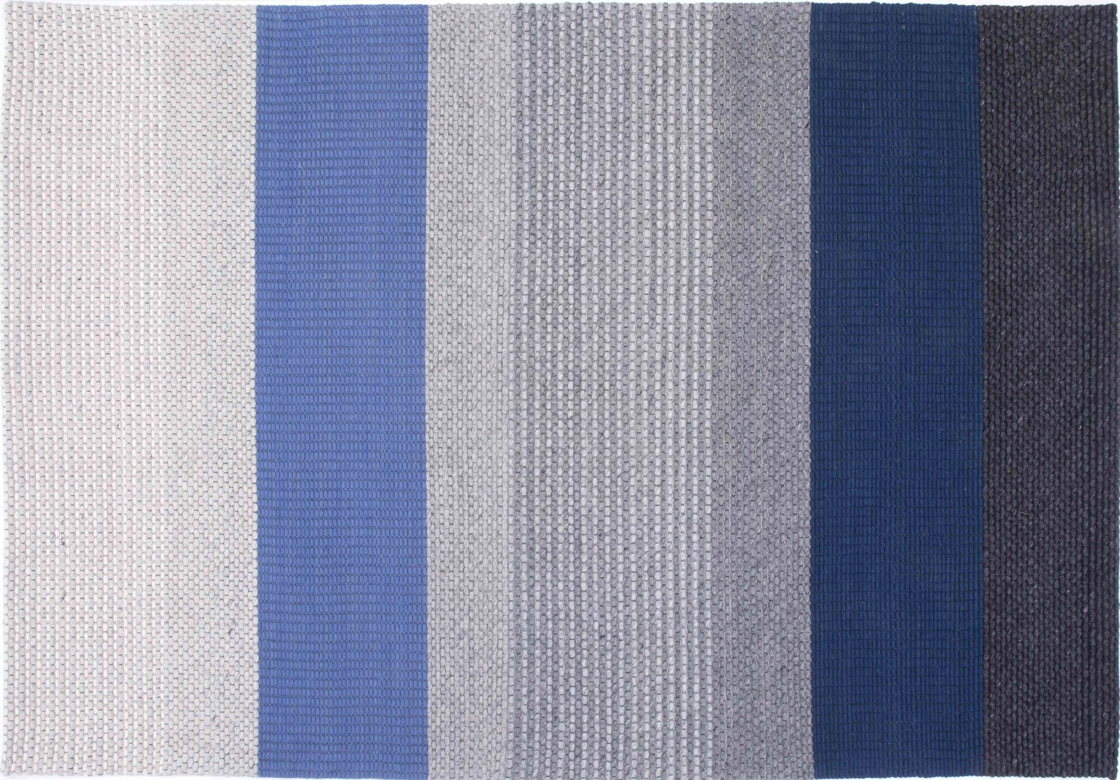 Cook Cove Area Rug in a finished interior.