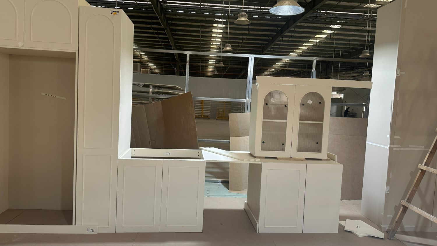 Base cabinets and prep counter trial-fitted with the upper display unit above