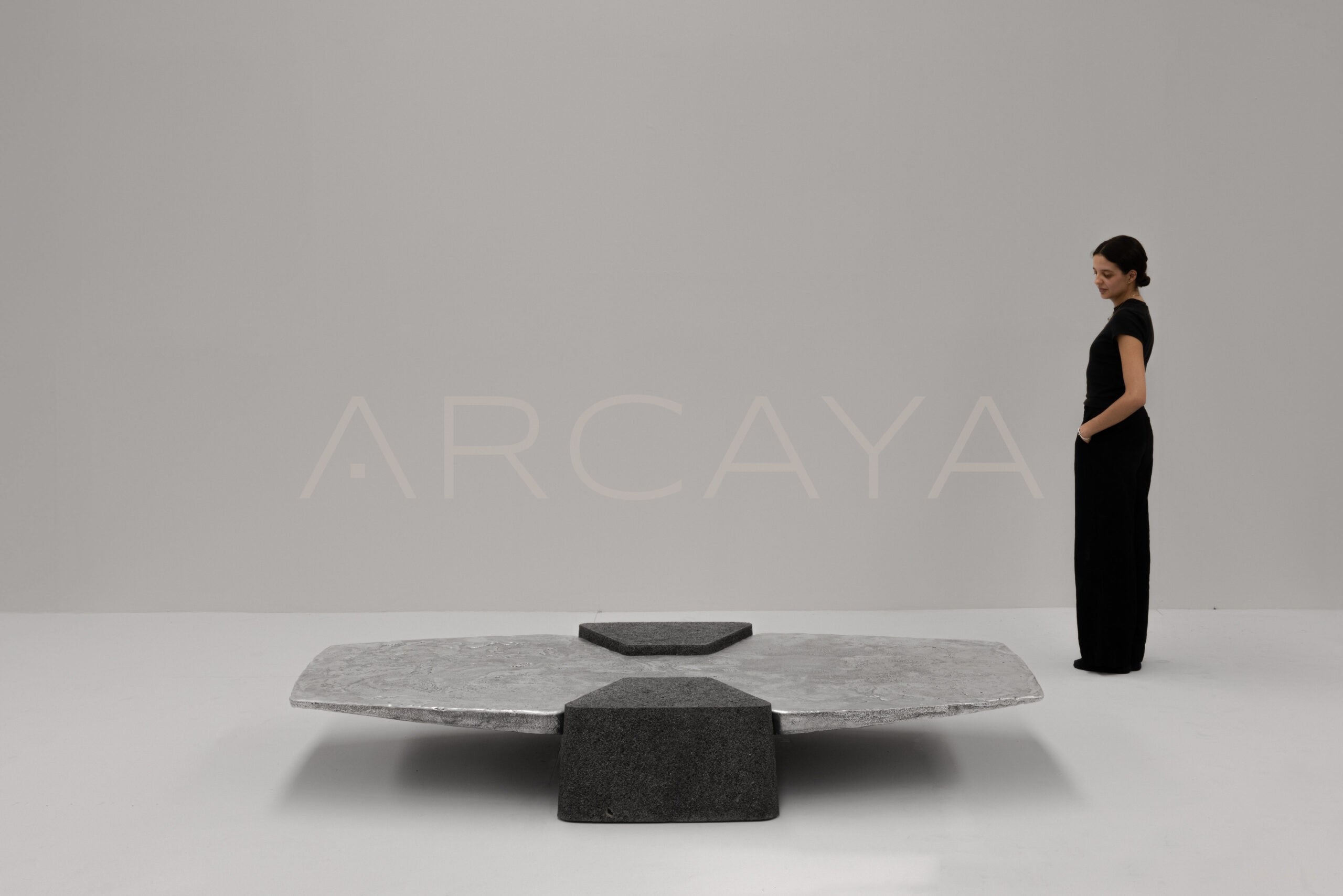 Exhuma Cast Metal Volcanic Stone Coffee Table - scene