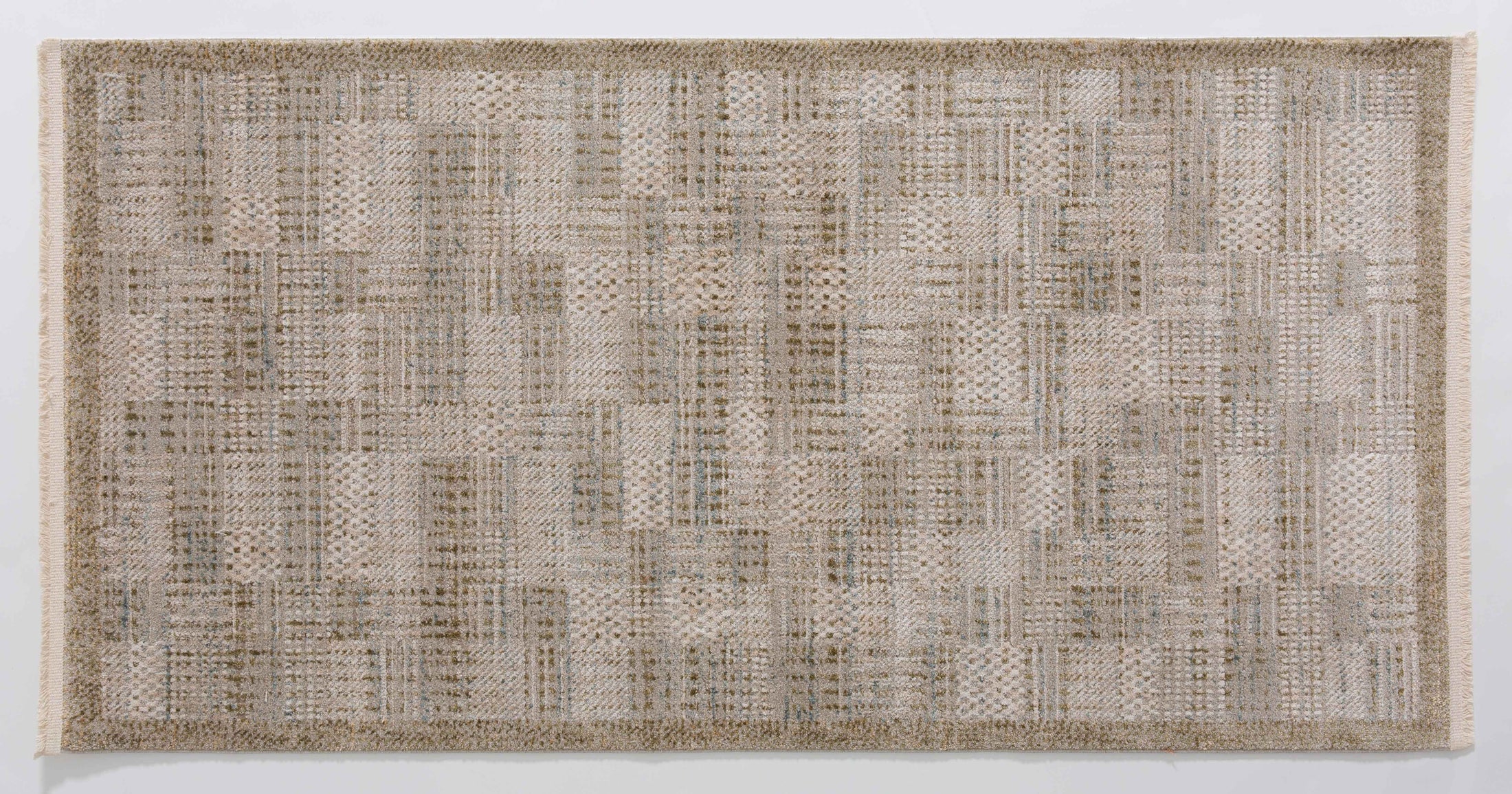 Infinitude Atlas Area Rug in a finished interior.