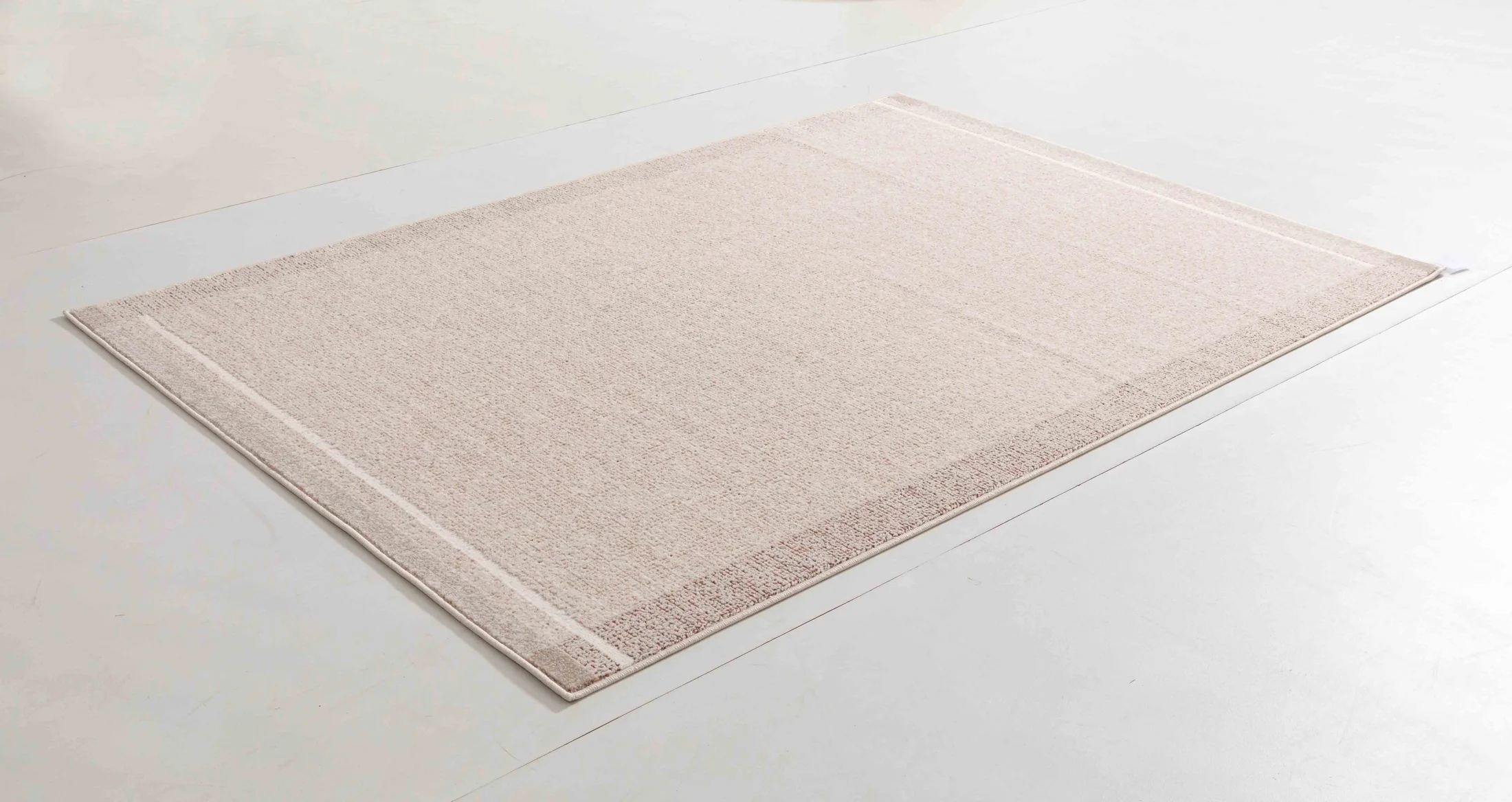 Locke Atlas Area Rug in a finished interior.