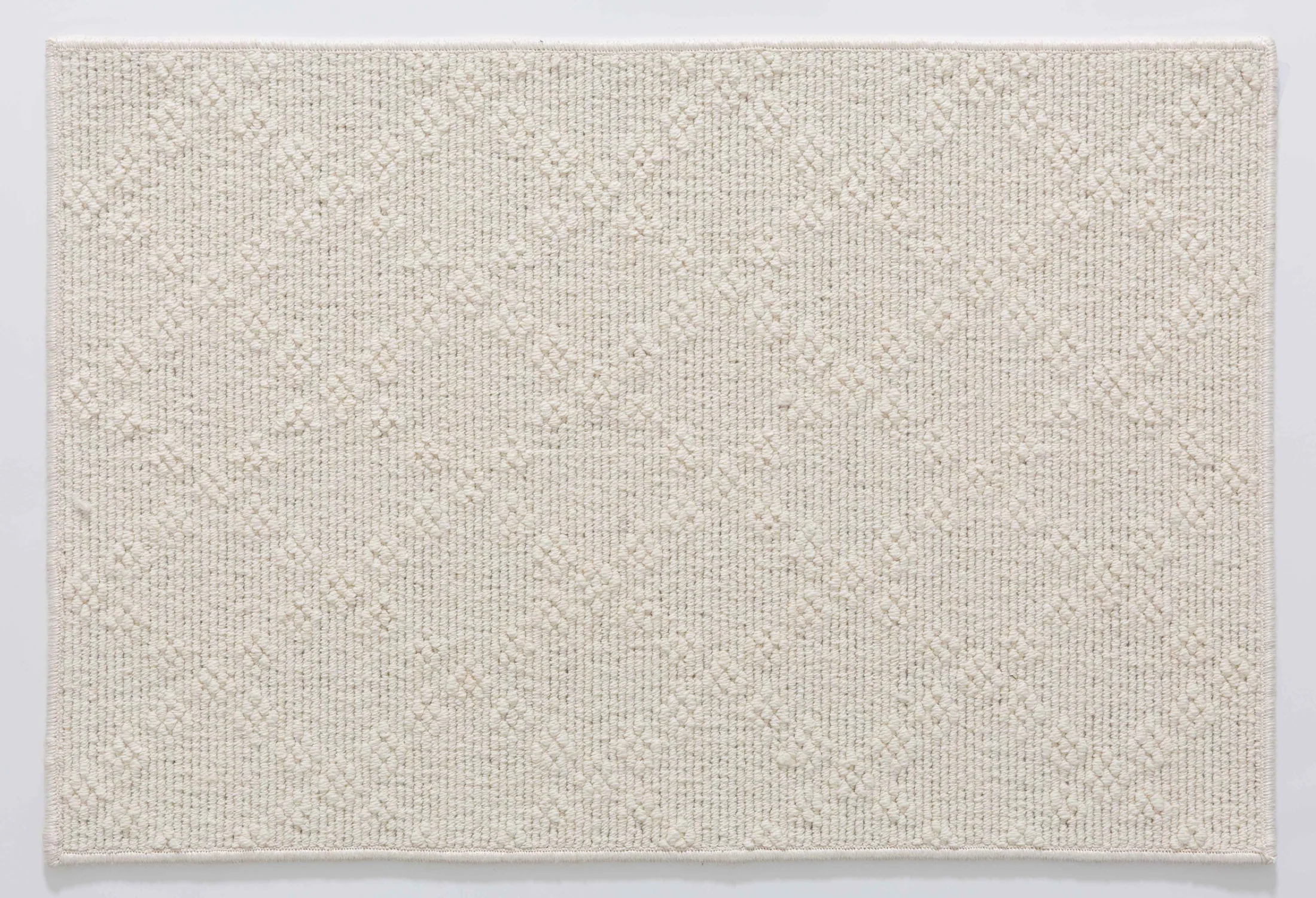 Wheat Dawn Area Rug in a finished interior.