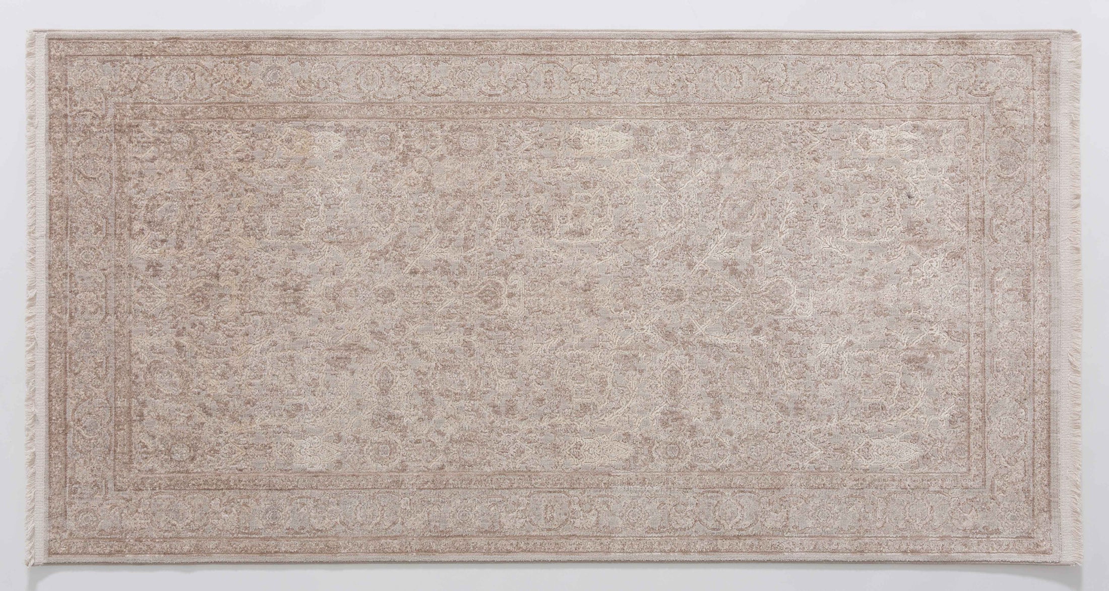 Angel Bloom Area Rug in a finished interior.