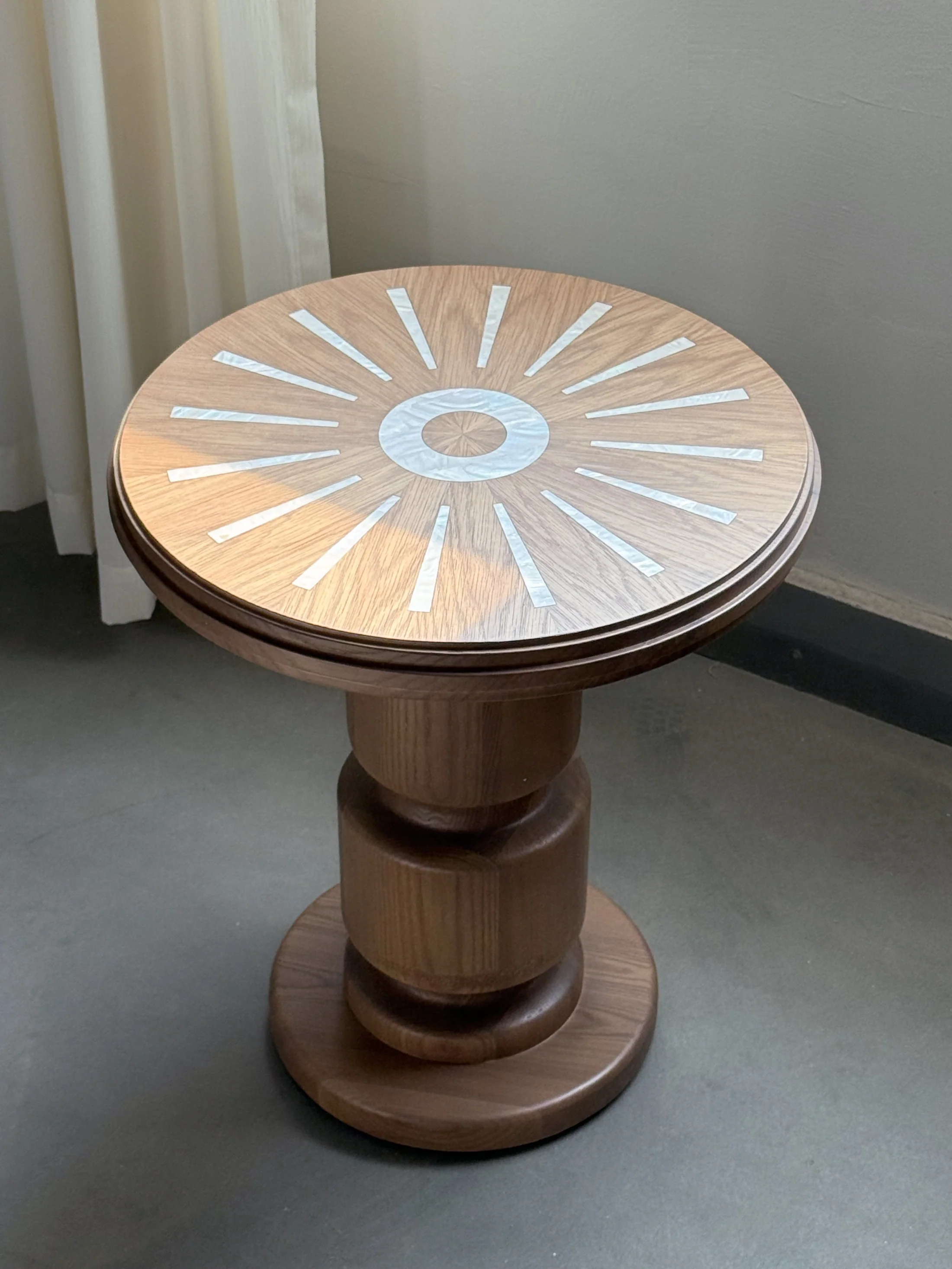 A00025 Side Table in a finished interior.