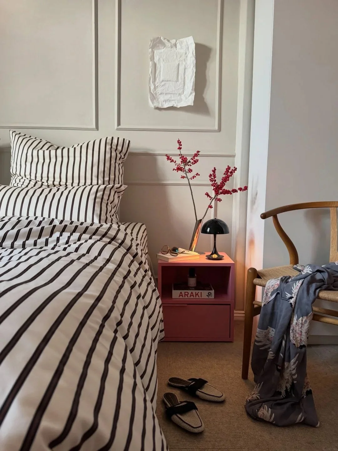 Use a small bedside cabinet for everyday clutter