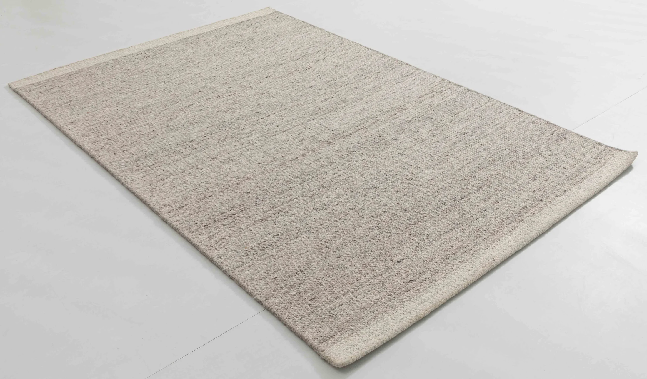Bus Atlas Area Rug in a finished interior.
