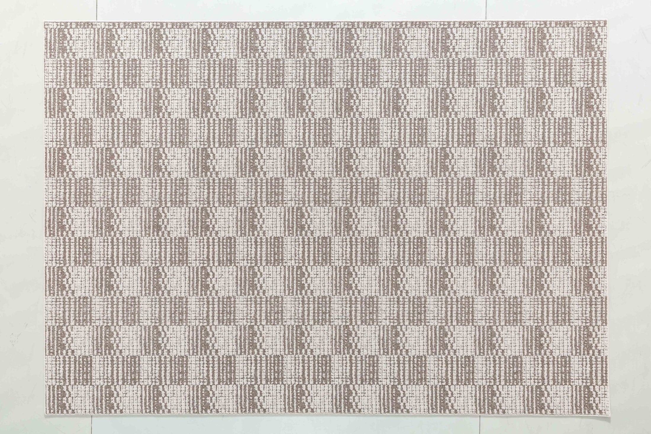 Sands Bloom Area Rug in a finished interior.