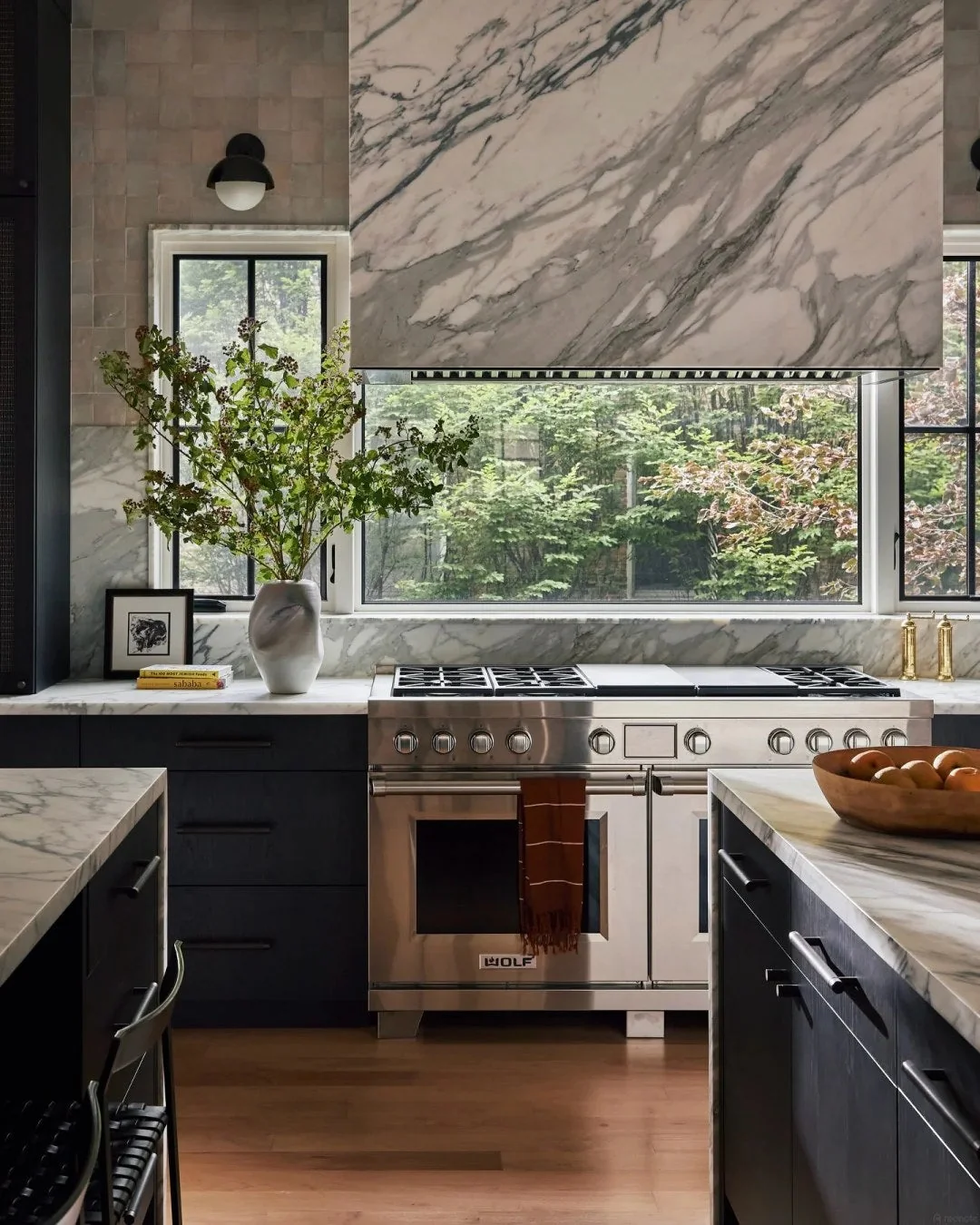 Let a dramatic stone backsplash become the focal point