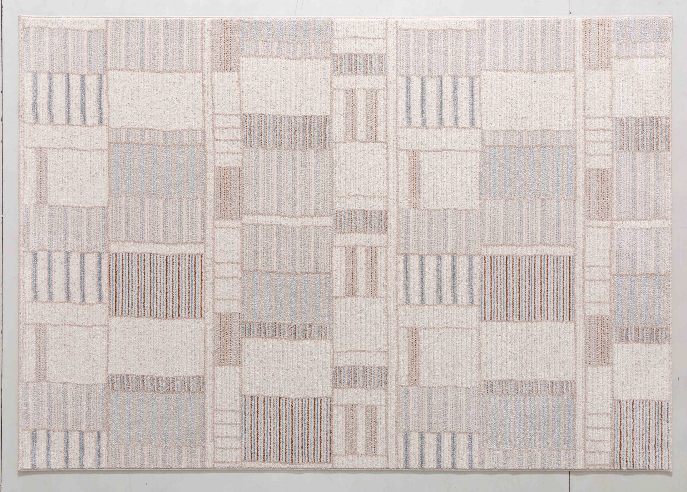 Garden Atlas Area Rug in a finished interior.