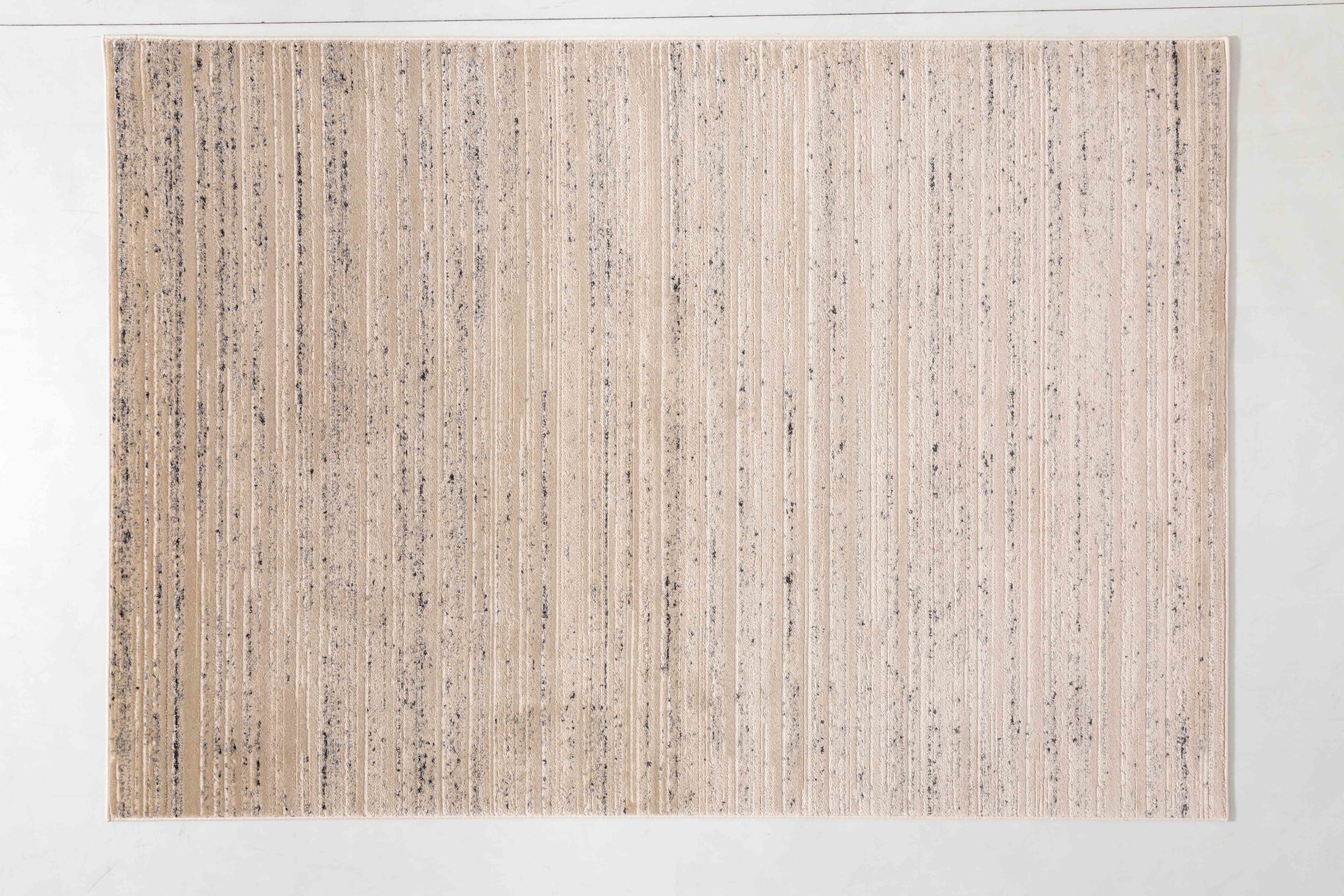 Grey Arc Area Rug in a finished interior.