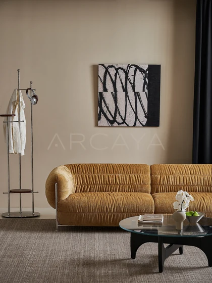 Willow Haven Sofa - front view of the gathered upholstered sofa beside a floor lamp