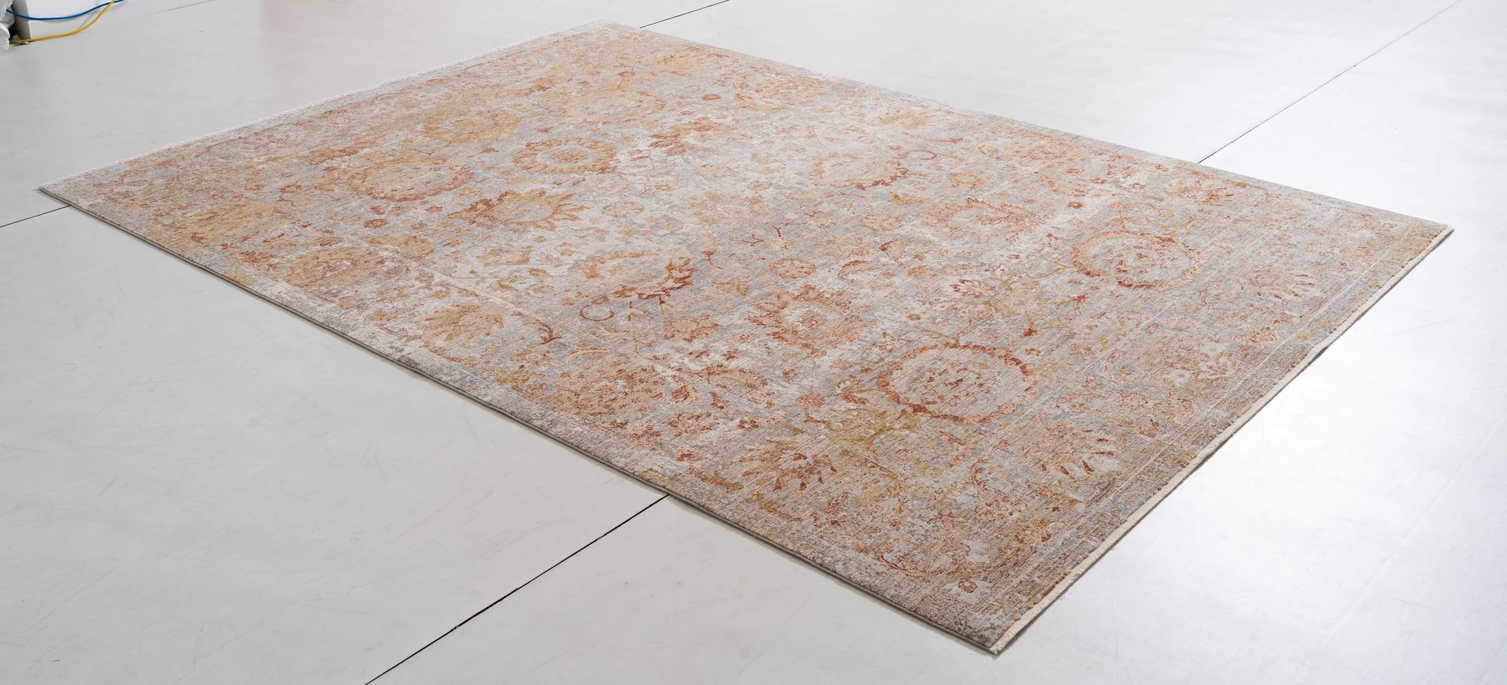 Legend Cairn Area Rug in a finished interior.