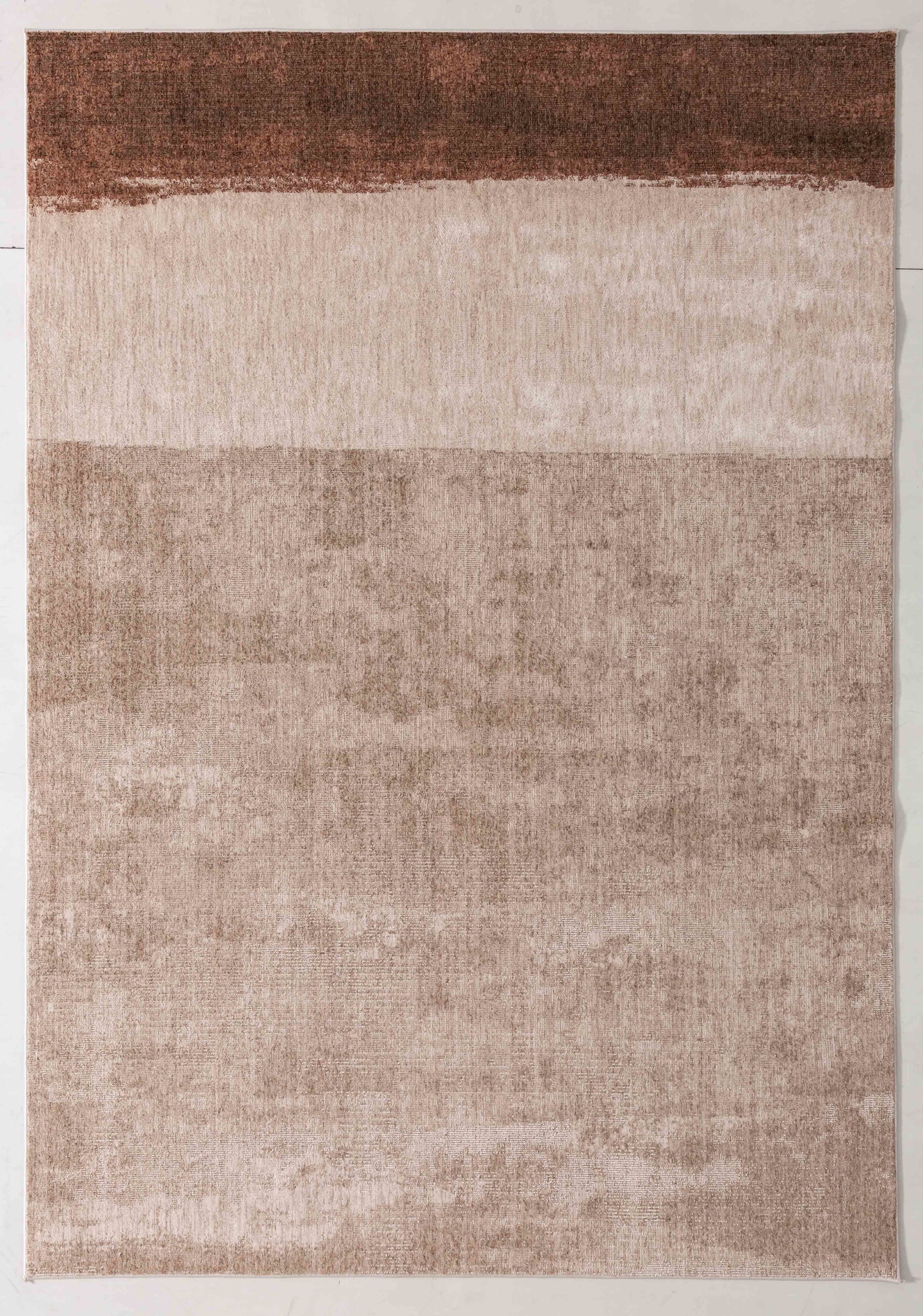 Painter Glade Area Rug in a finished interior.