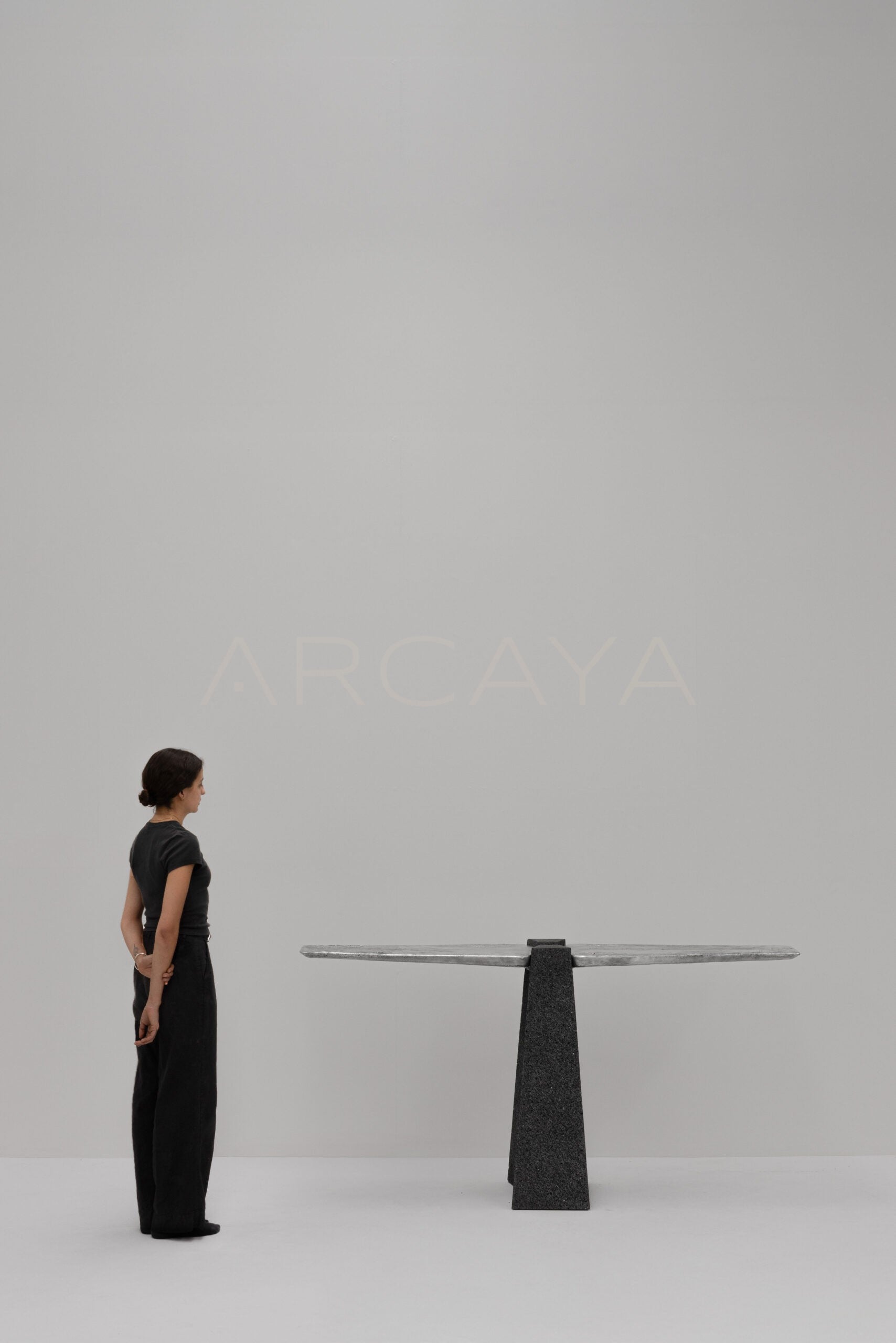 Exhuma Cast Metal Volcanic Stone Console Table - scene