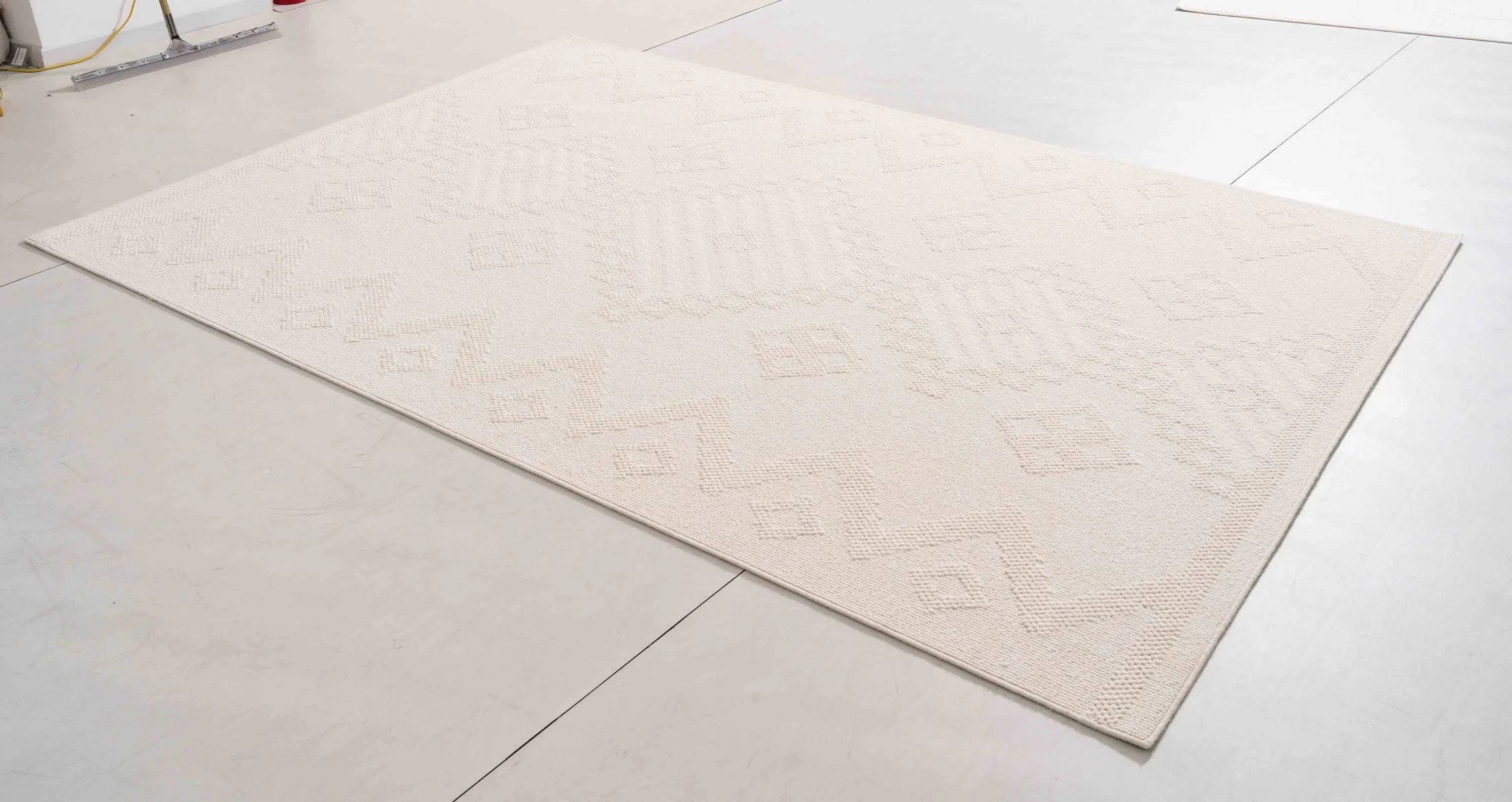 Wheat Bloom Area Rug in a finished interior.