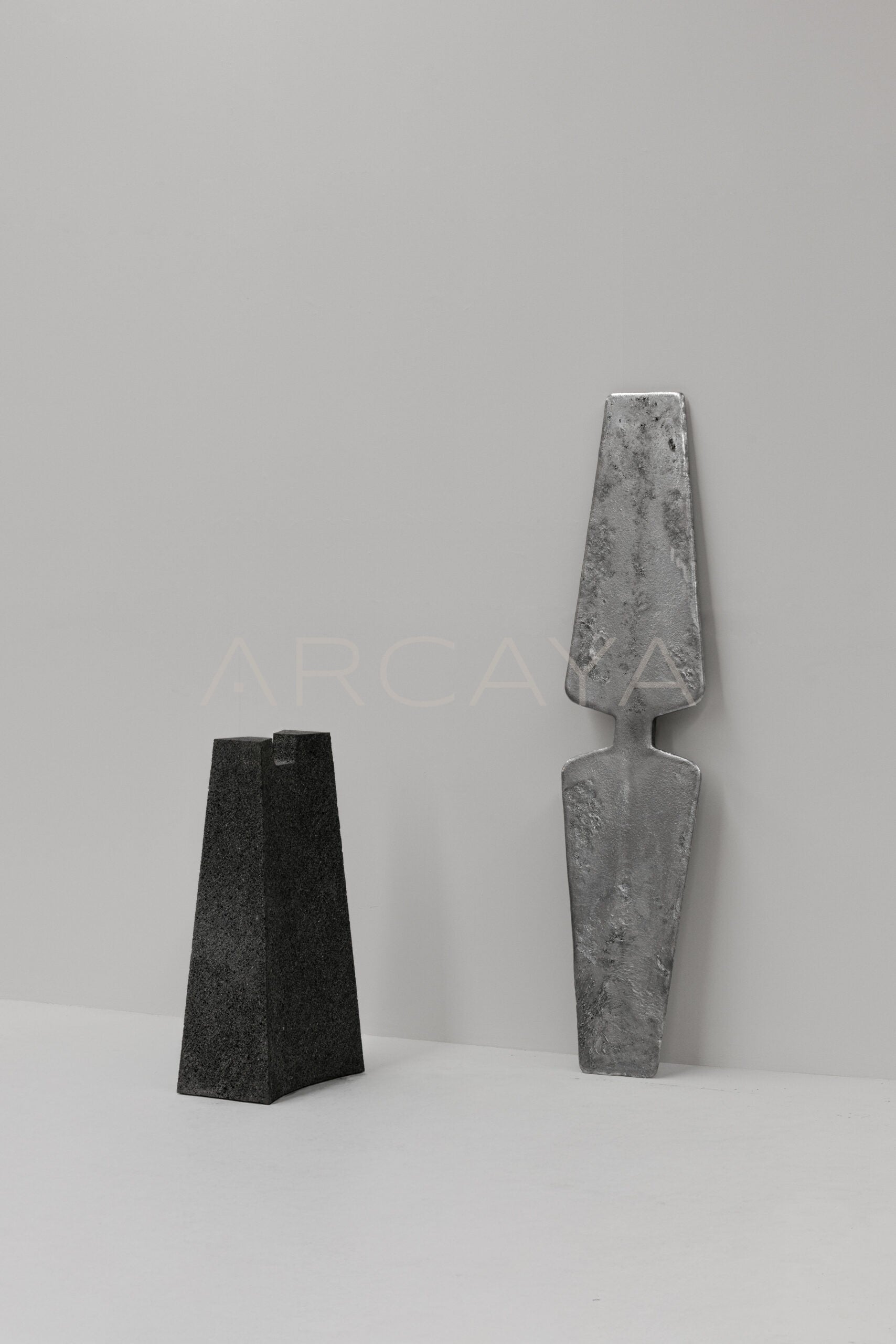 Exhuma Cast Metal Volcanic Stone Console Table - scene
