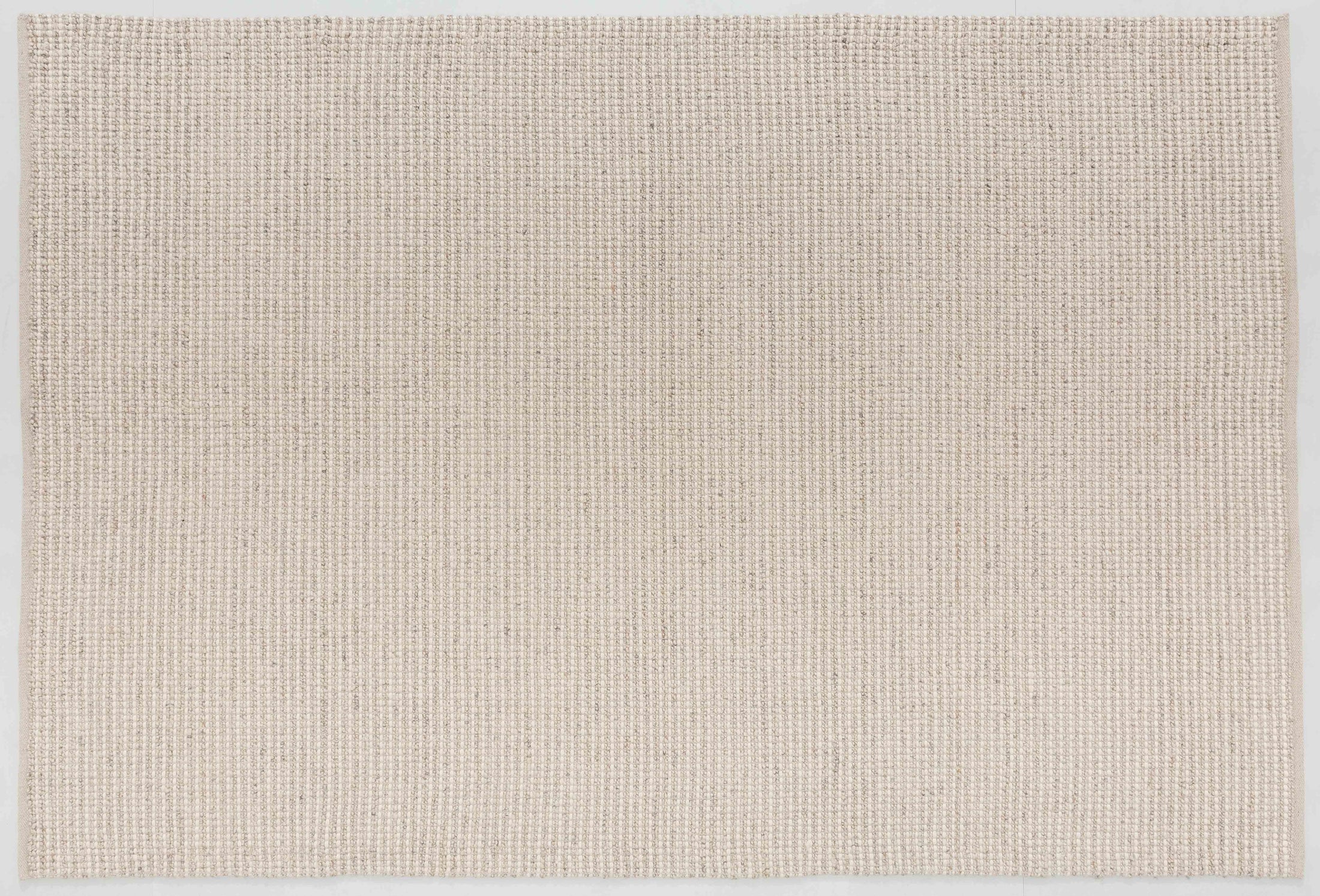 Spin Atlas Area Rug in a finished interior.