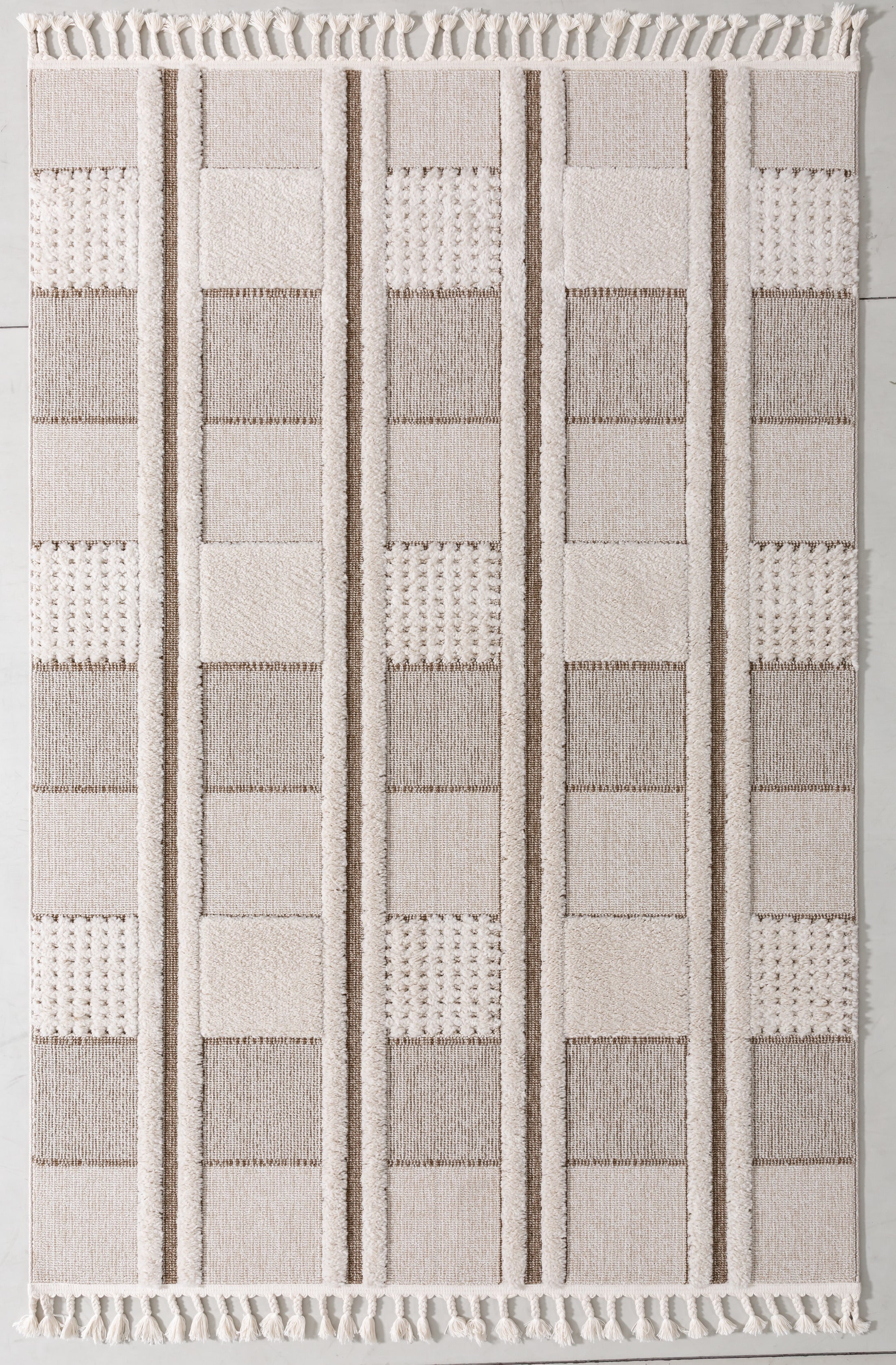 Puff Cairn Area Rug in a finished interior.