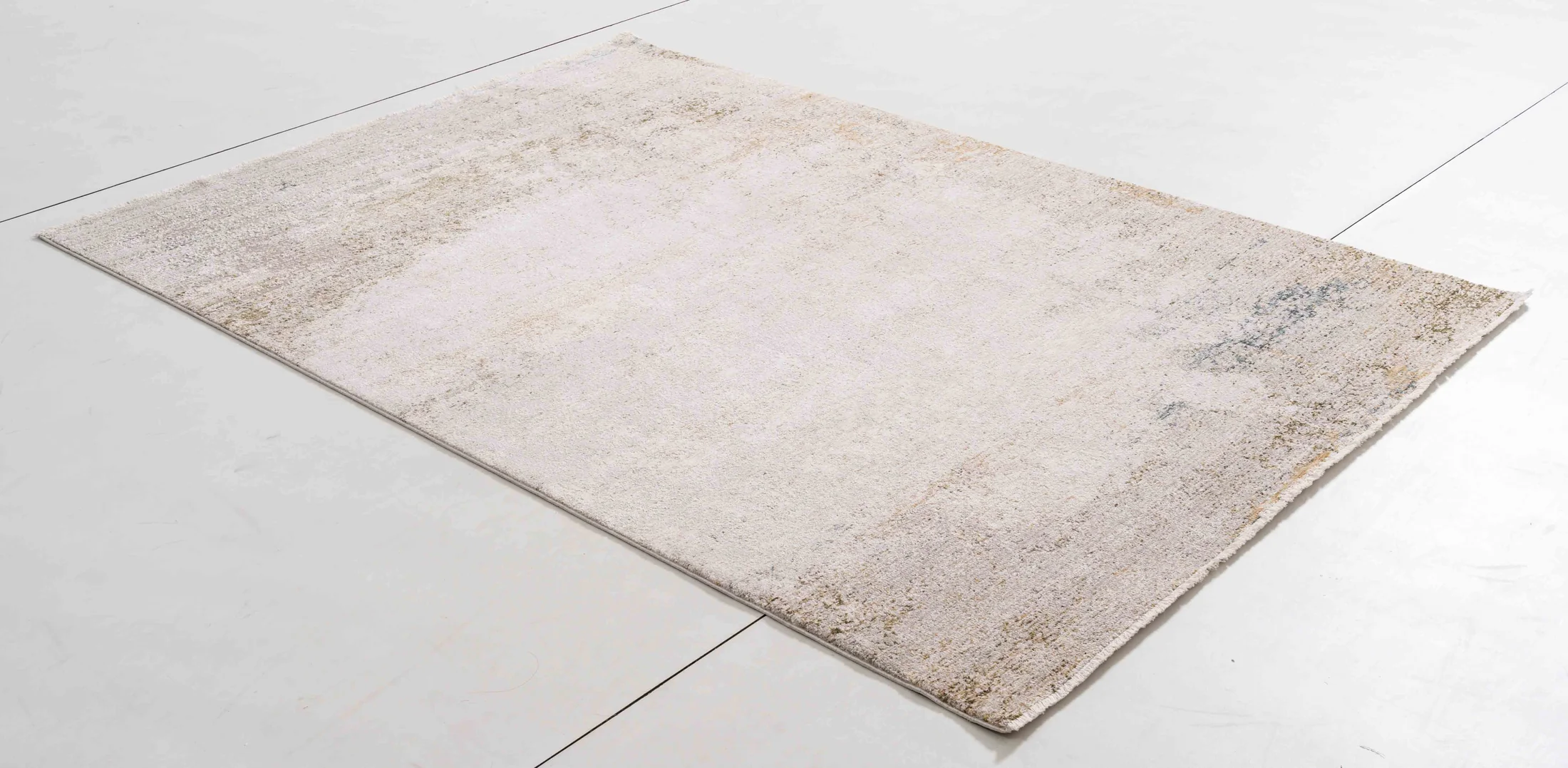 Infinitude Dawn Area Rug in a finished interior.