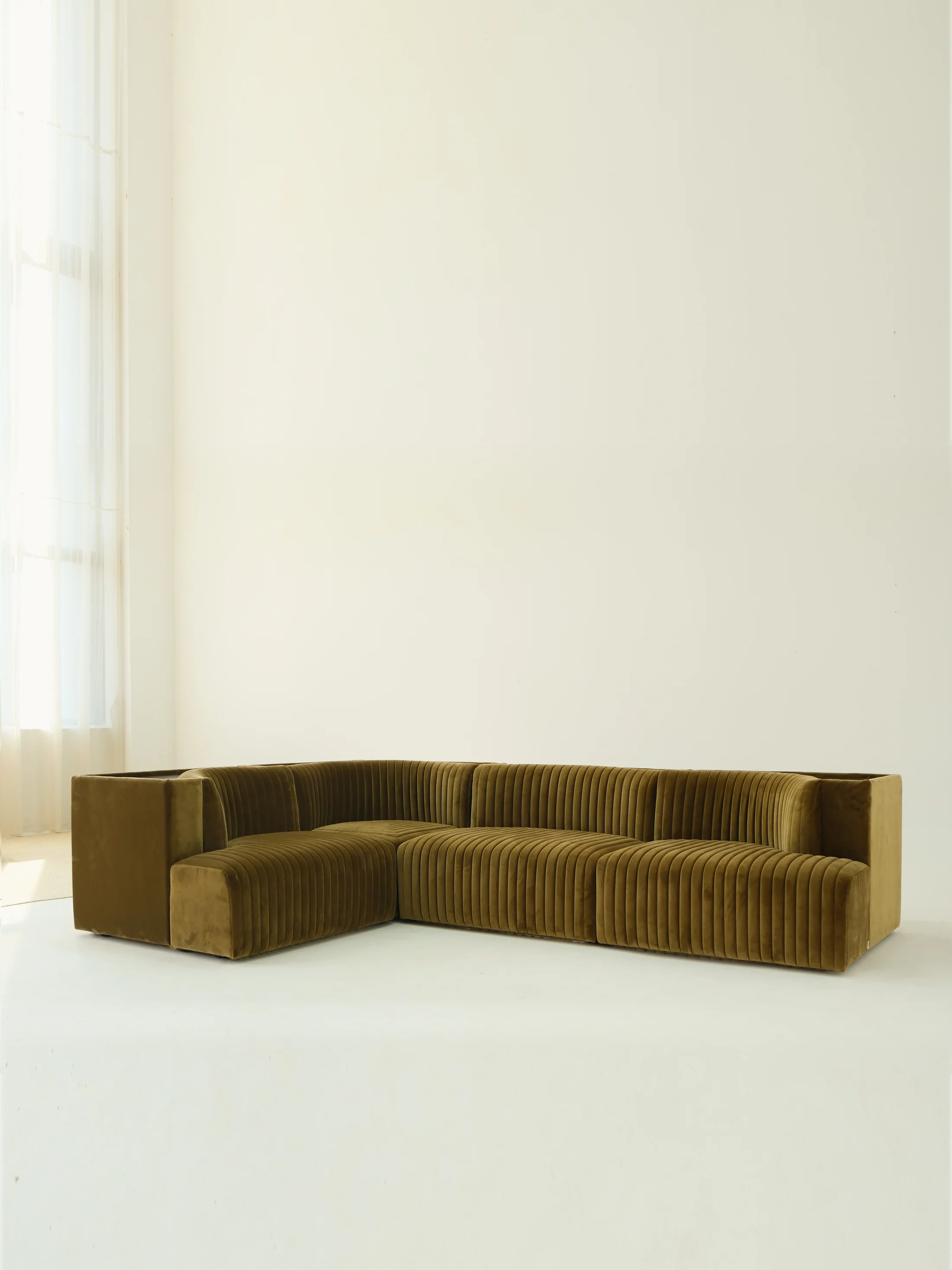 Reed Field Sofa in a finished interior.