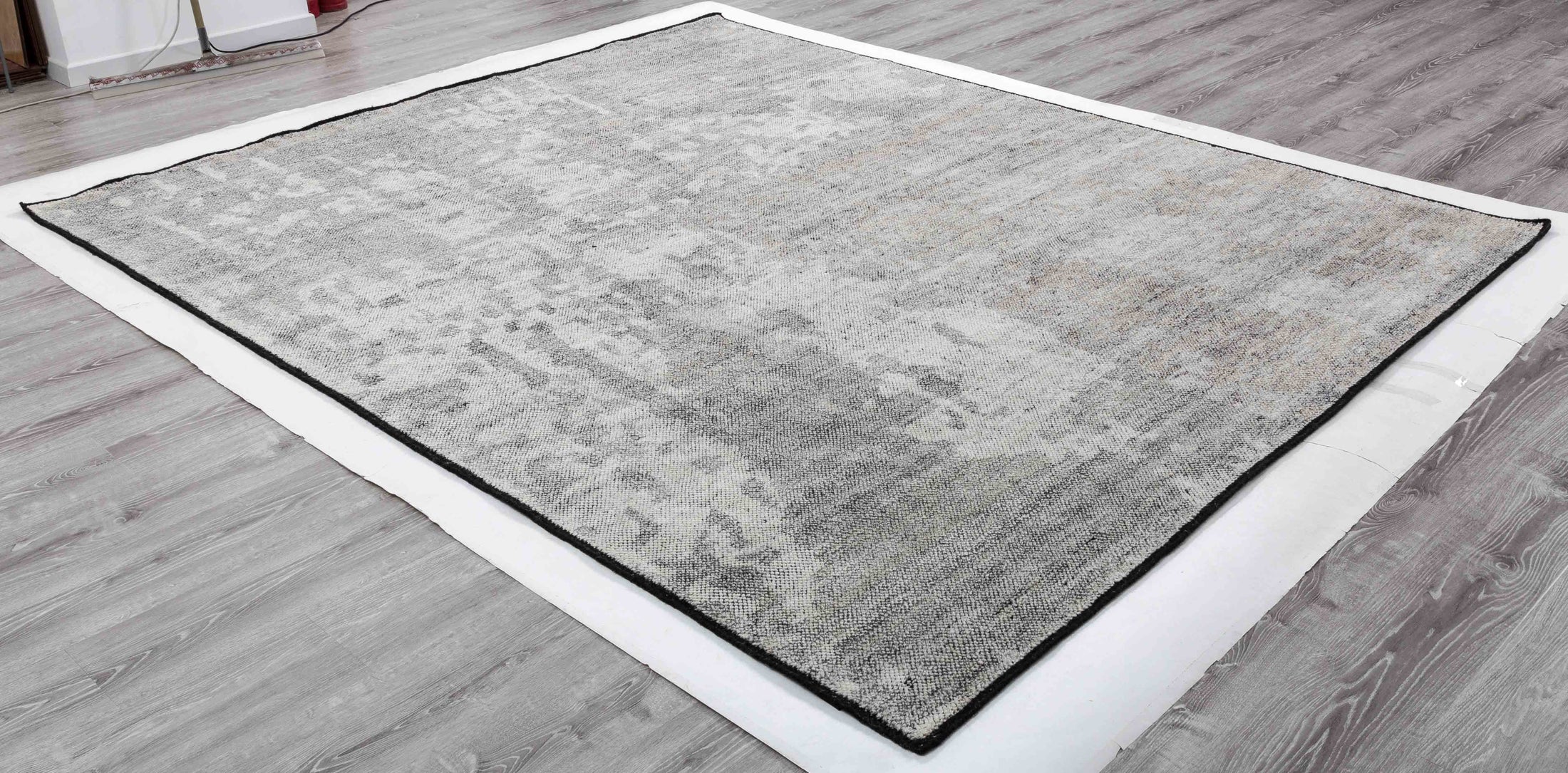 Inkstone Arbor Area Rug in a finished interior.