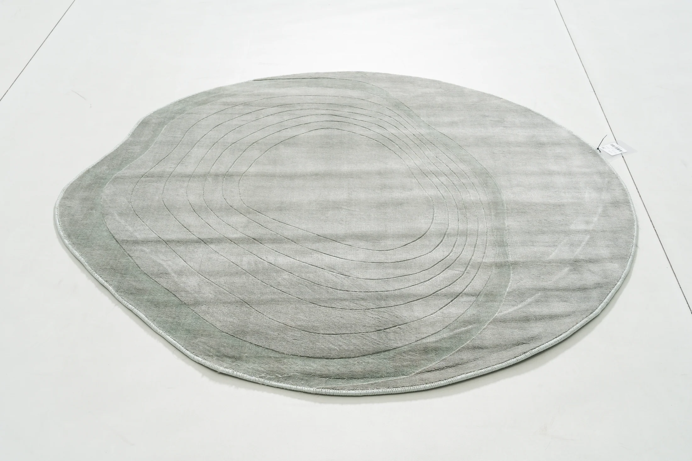 Teana Ember Area Rug in a finished interior.