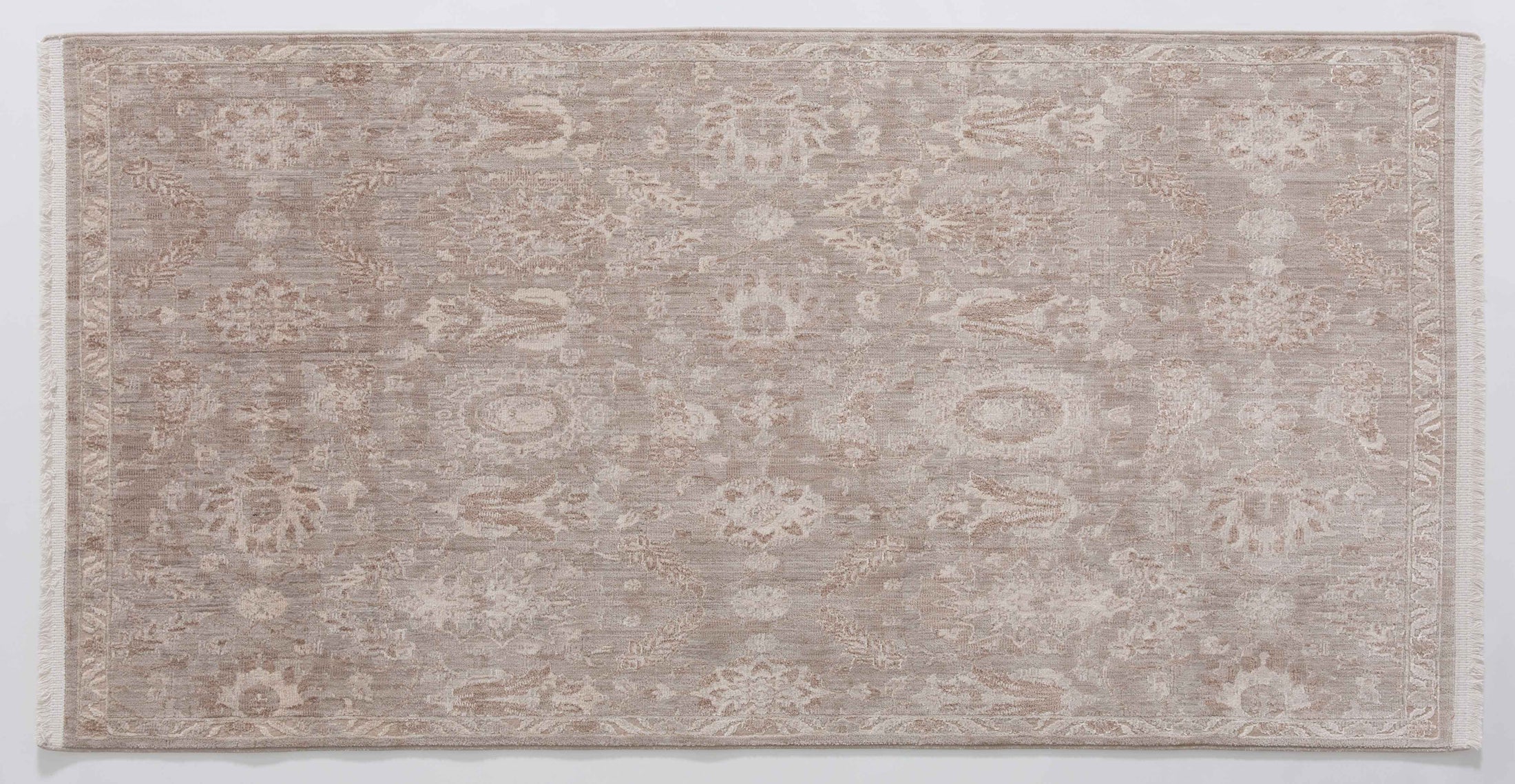 Angel Arc Area Rug in a finished interior.