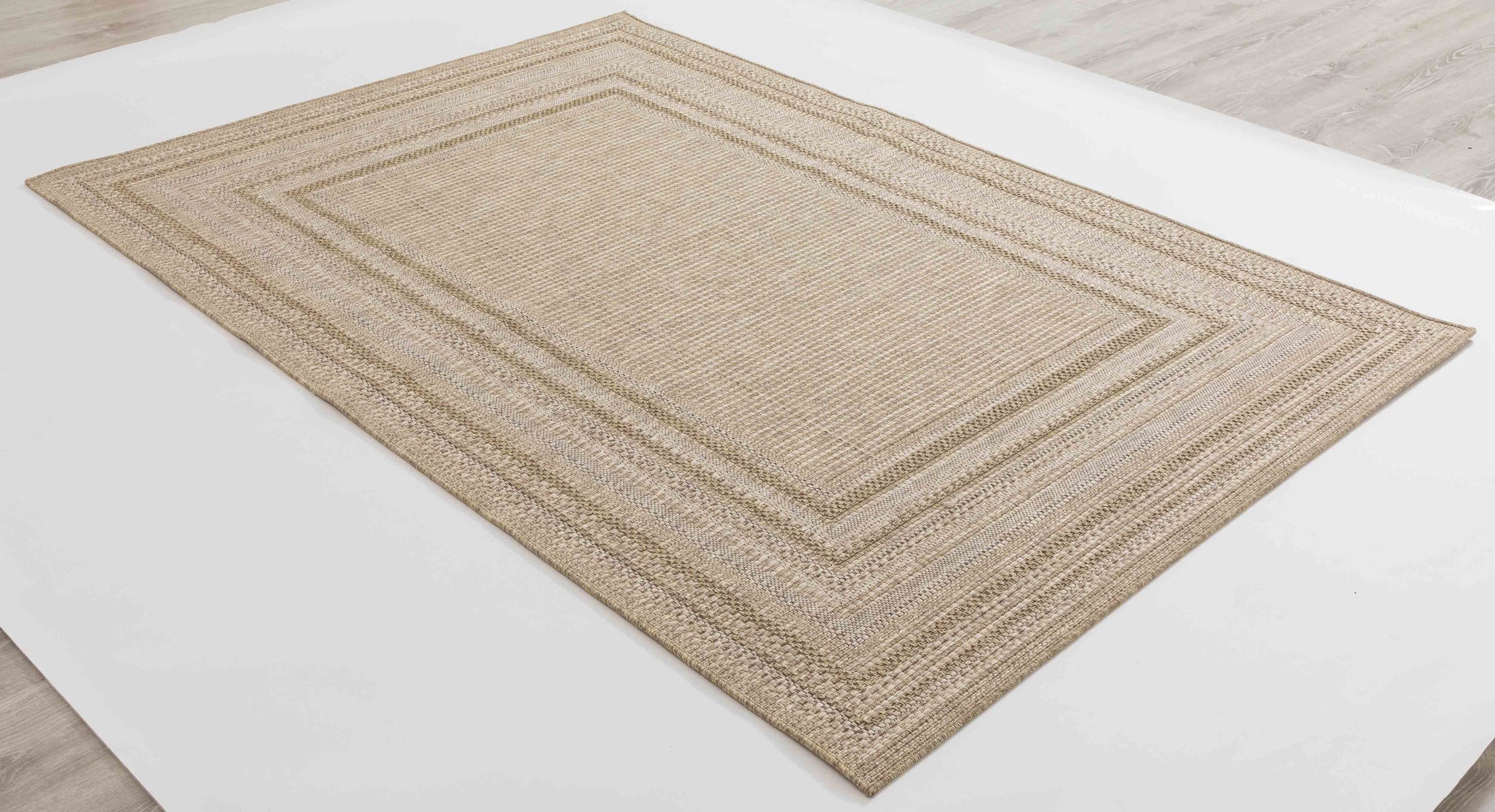 Summer Arc Area Rug in a finished interior.