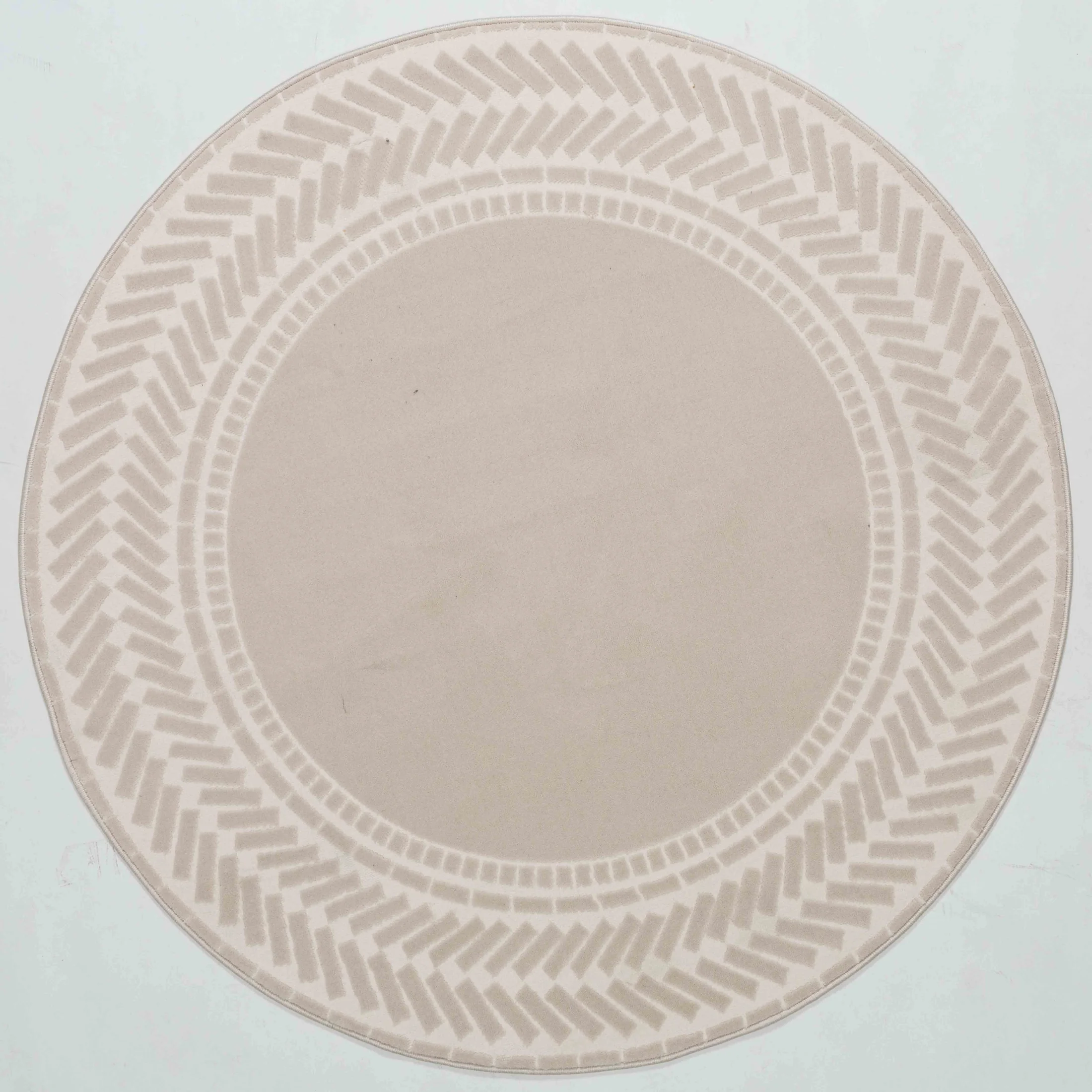 Whisper Bloom Area Rug in a finished interior.