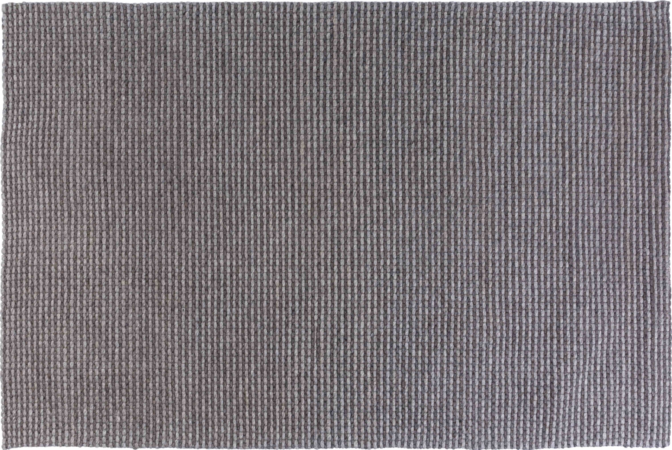 Cook Arc Area Rug in a finished interior.