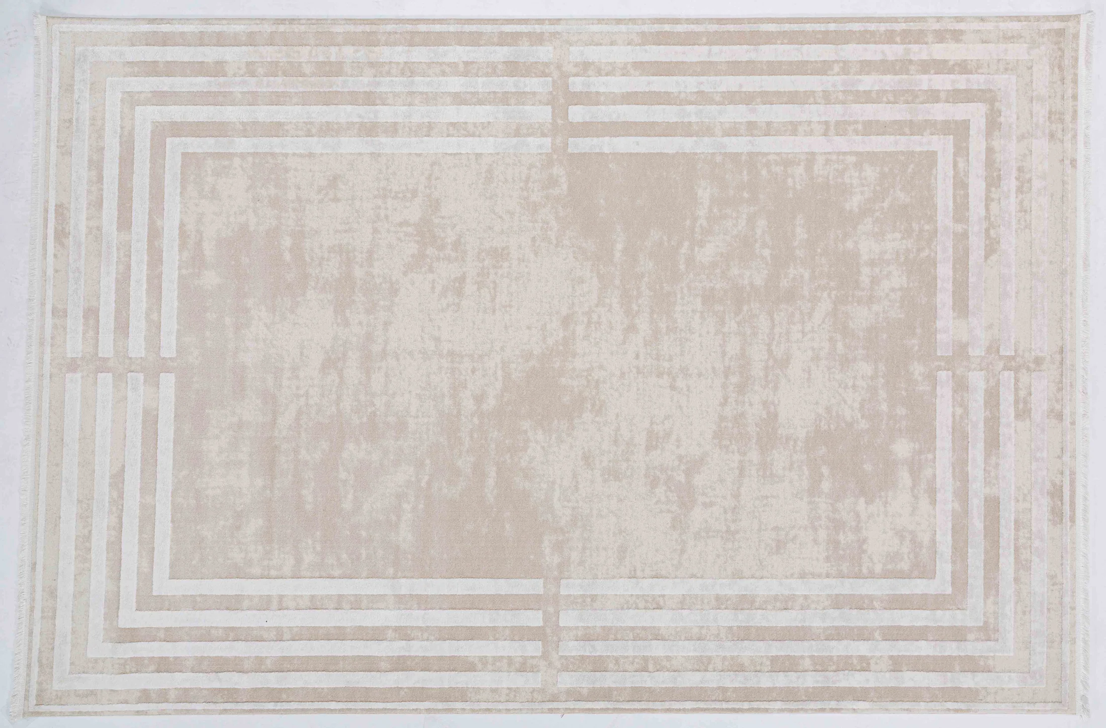 Taboo Cairn Area Rug in a finished interior.