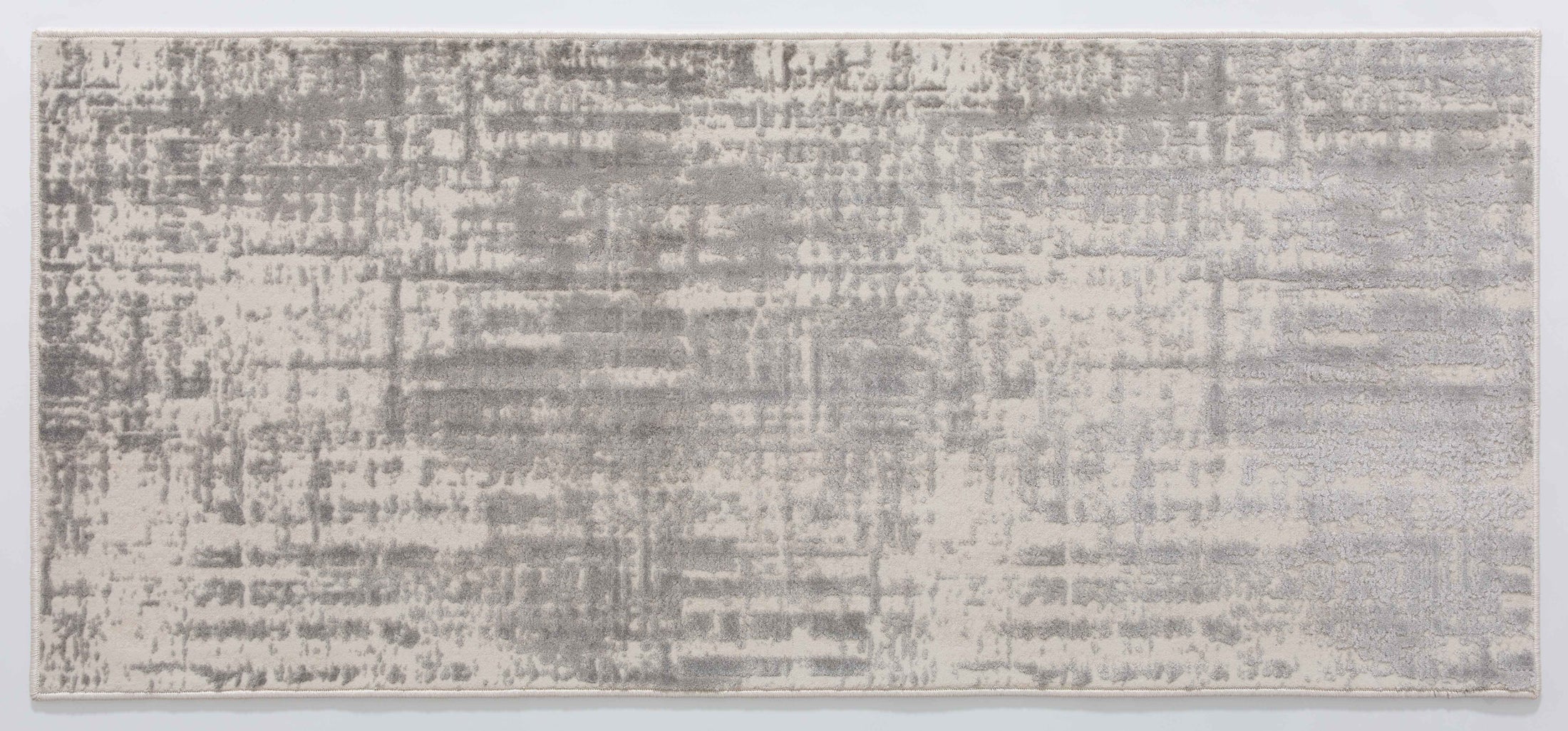 Taboo Halo Area Rug in a finished interior.