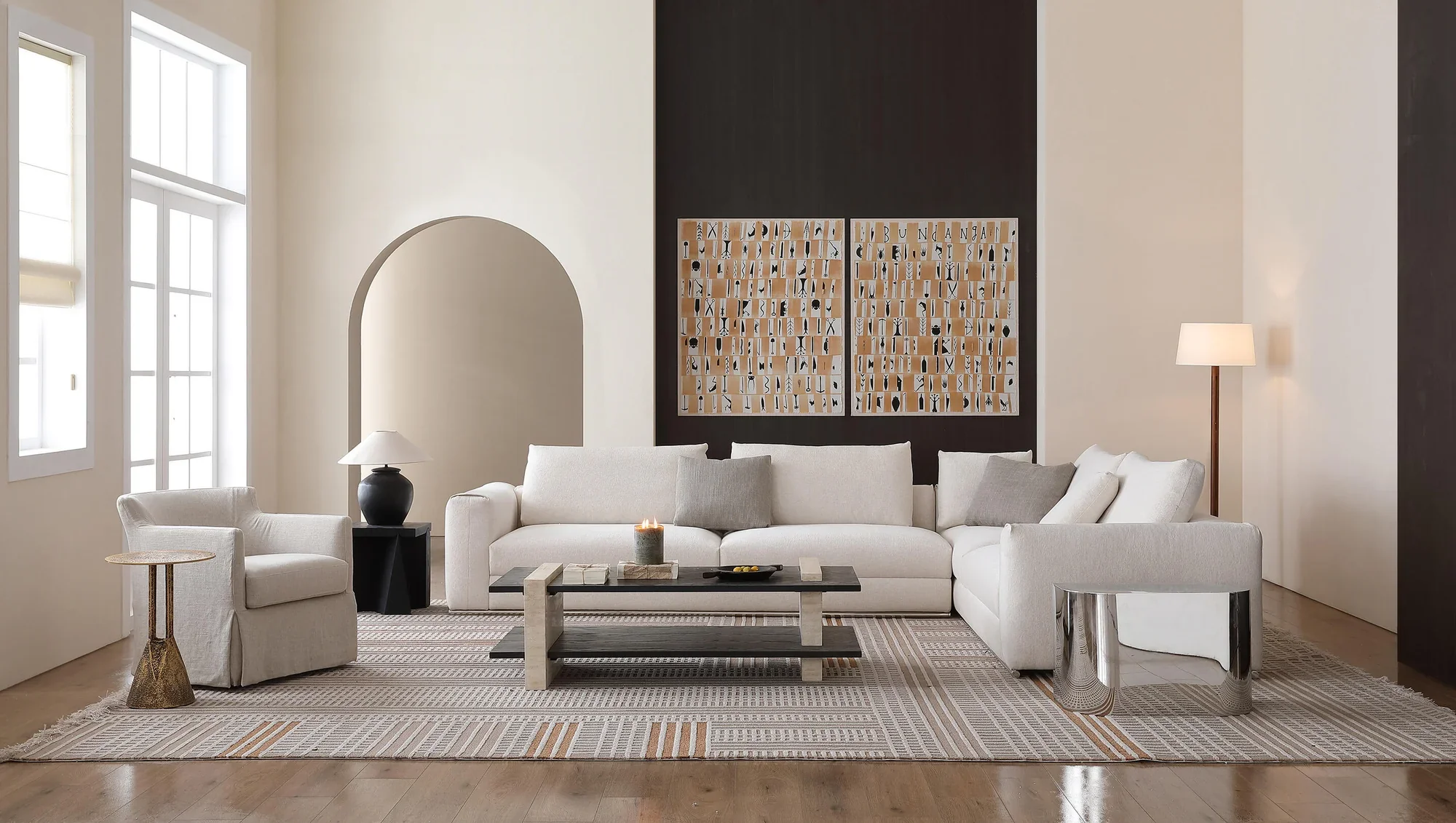 Arcaya furnished living room with white sofa and lounge chair