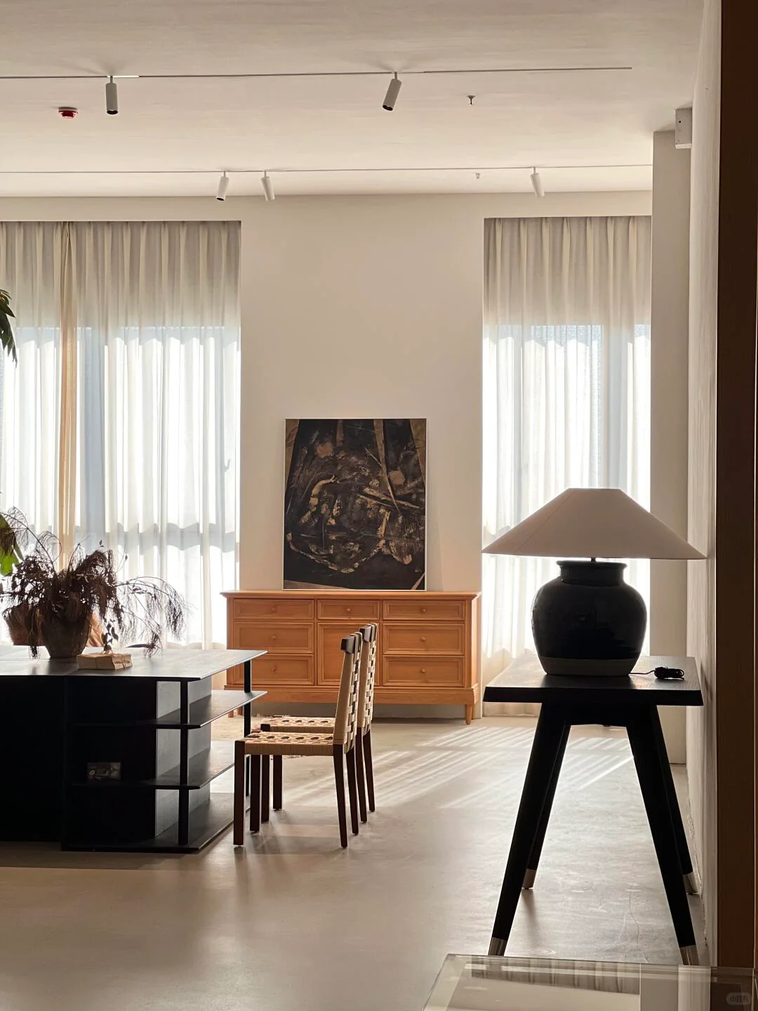 Curated furniture and lighting inside a Foshan showroom